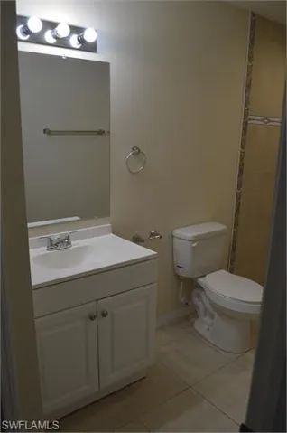 Bathroom featuring vanity and light tile patterned flooring