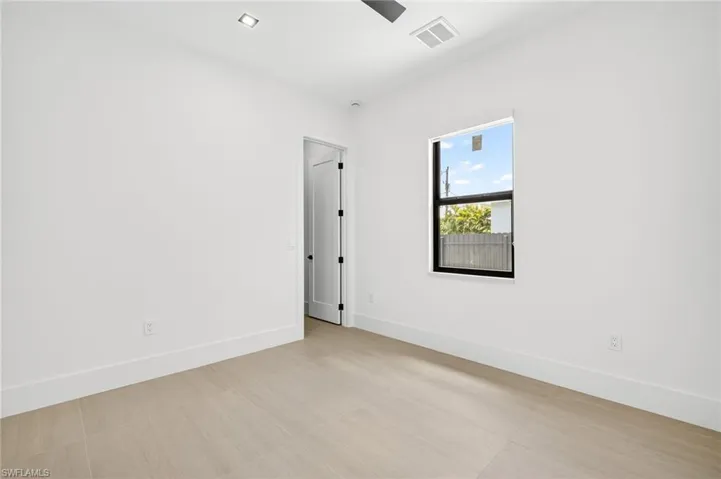 Spare room with baseboards