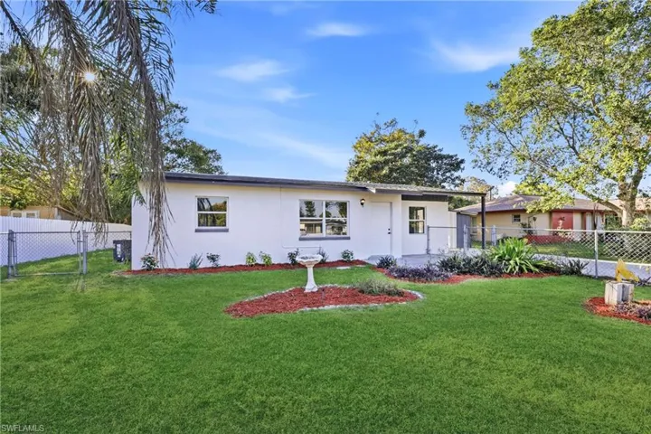 Single story home with stucco siding