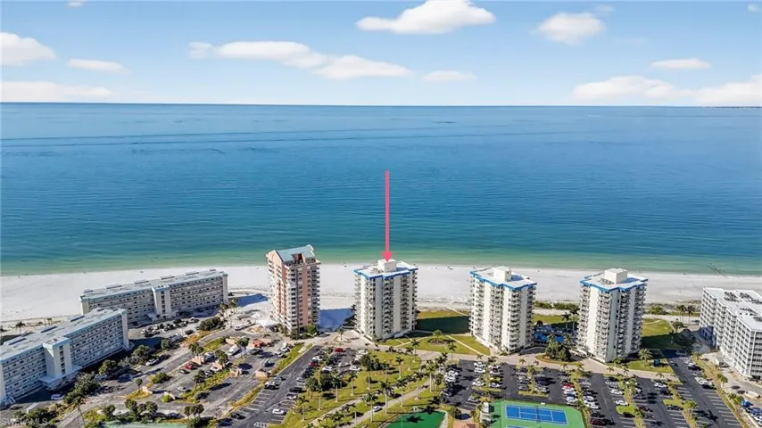 Aerial view of waterfront with a beach