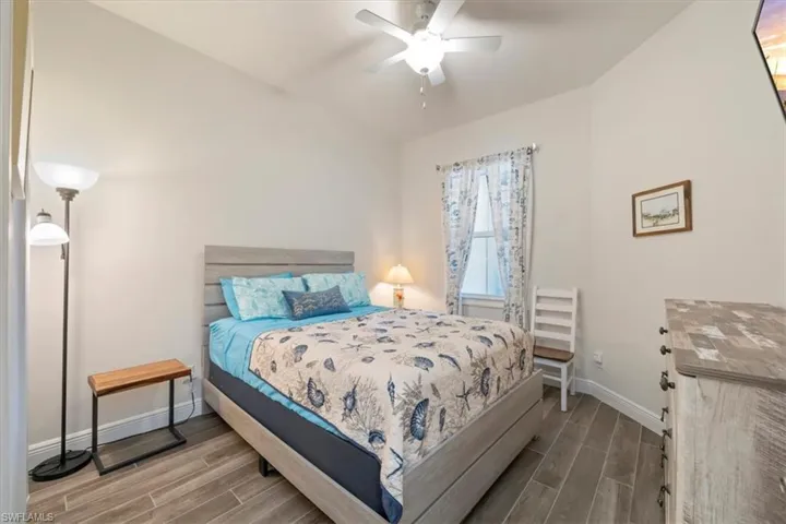 Guest bedroom with beautiful ceiling fan