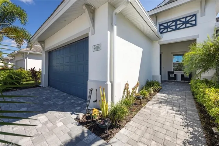 Paver walkway entrance into 9016 Saint Lucia Drive