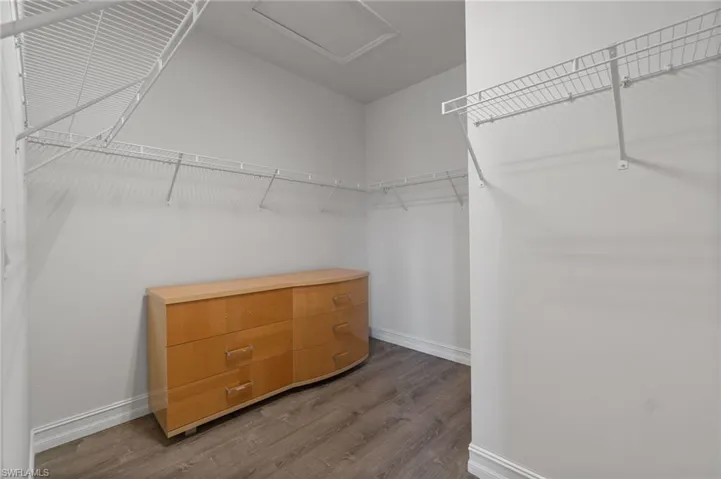 Spacious primary walk-in closet