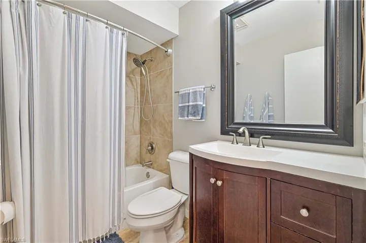 Primary bath with lovely new vanity and tub/shower.
