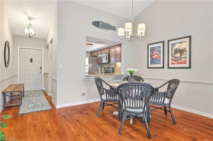 Fresh coat of soothing neutral paint.  Great space for dining or a good card game with friends.