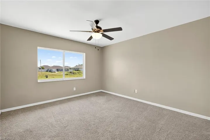 SECOND BEDROOM WITH WALK-IN CLOSET.