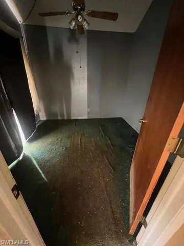 Unfurnished room featuring ceiling fan