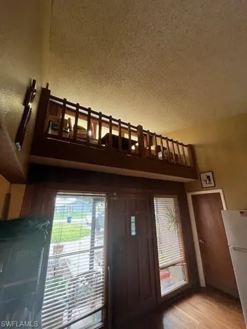 Foyer with a textured ceiling