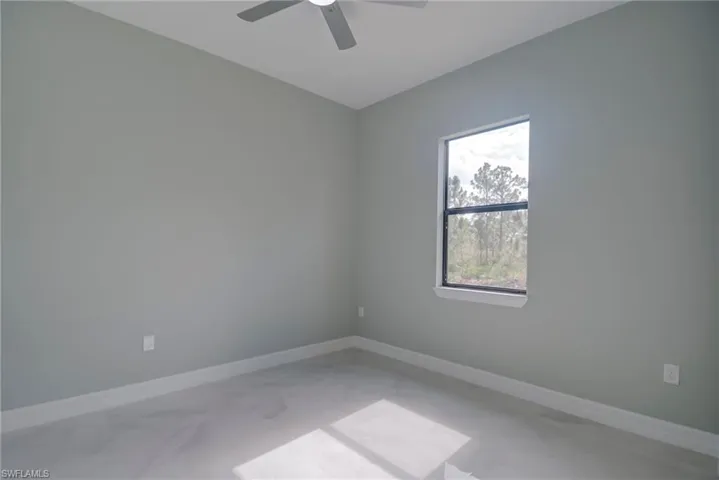 Spare room with baseboards
