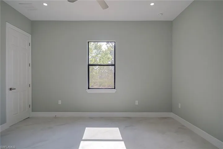 Unfurnished room with recessed lighting and a ceiling fan