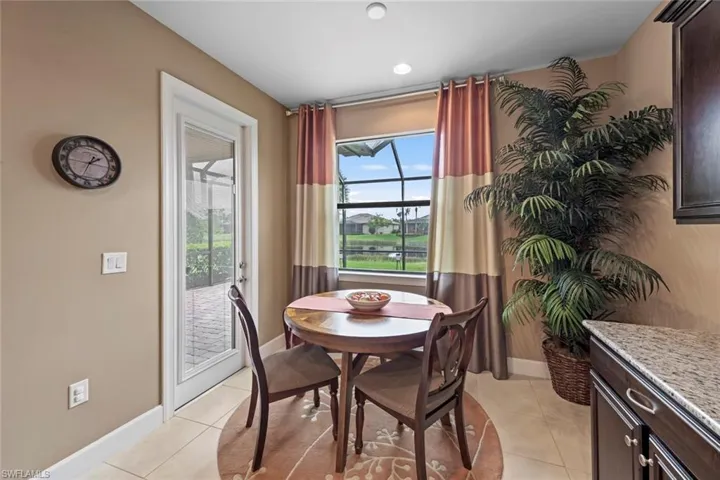 Breakfast nook with doorway to lanai.
