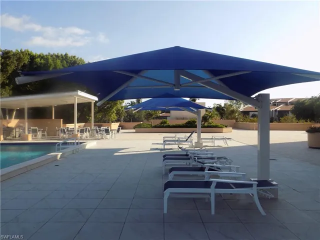 Community pool featuring a patio area