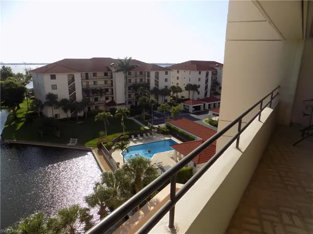Balcony with view of pool
