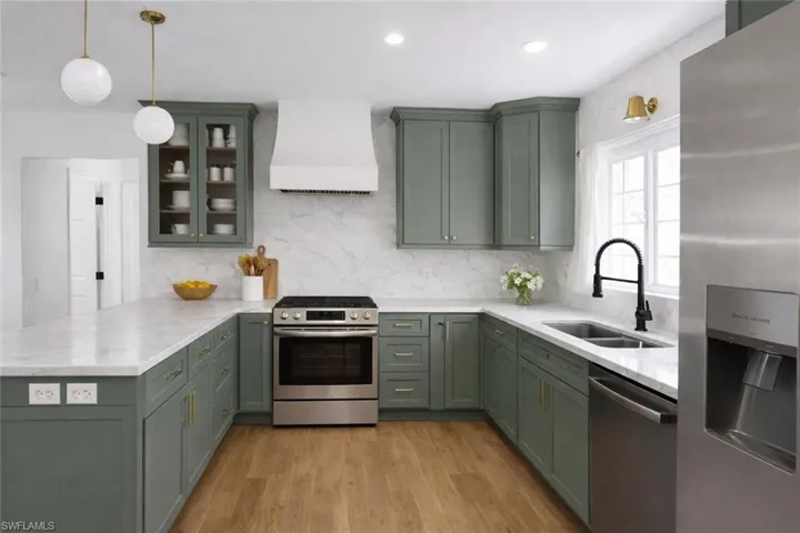 Photo includes reality renovation and/or staging to showcase the possibility of the Kitchen. Design services included with purchase!