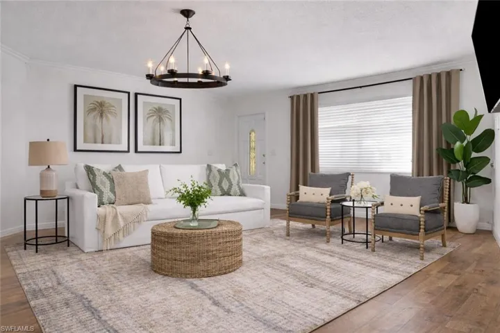 Photo includes reality renovation and/or staging to showcase the possibility of the Living Room. Design services included with purchase!
