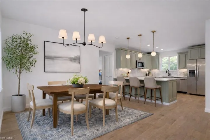 Photo includes reality renovation and/or staging to showcase the possibility of the Dining and Kitchen area. Design services included with purchase!