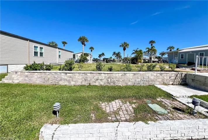 Graded and leveled buiding site with retaining wall