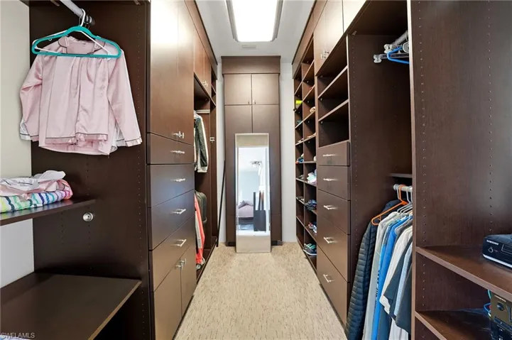 View of walk in closet - Virtually Edited Image