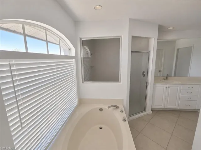 Primary Bathroom with AI Editing - Separate Shower and Soaking Tub!