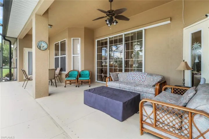 View of patio featuring a ceiling fan and outdoor lounge area