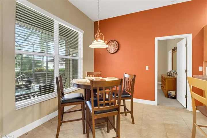 Dining room featuring baseboards and light tile patterned floors