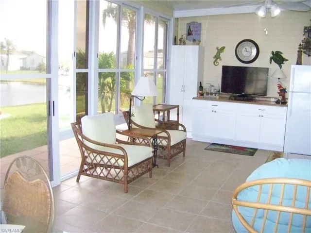 One pic of amazing rear lanai/Florida room! Very light and bright!