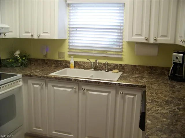 Pic #2 of kitchen. Nice window over sink!