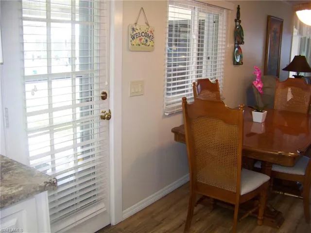 Front door and a peek of the dining area.