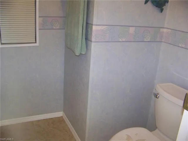 Separate room has shower/commode.