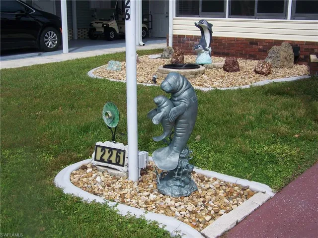 Dolphin fountain in background will convey with sale, as-is.