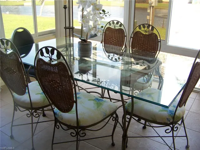 Rear lanai. This table & chairs conveys with the sale!!!