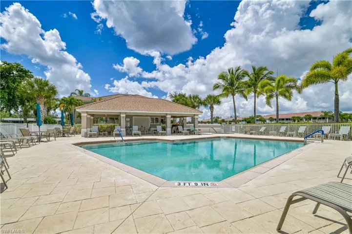 Community pool featuring a patio area