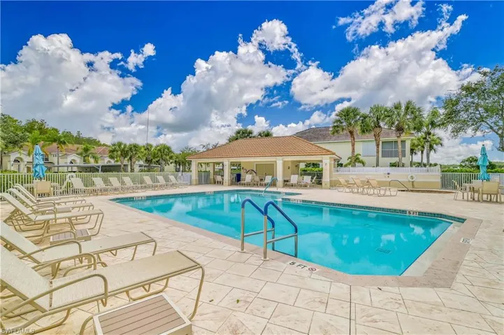 Community pool with a patio area