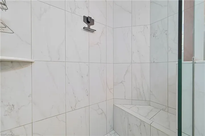 Bathroom with a tile shower