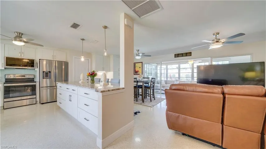 Open kitchen with high end features.