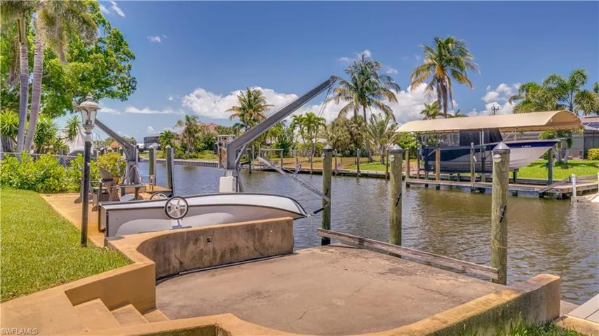 Cement dock area. Davits in good working condition.