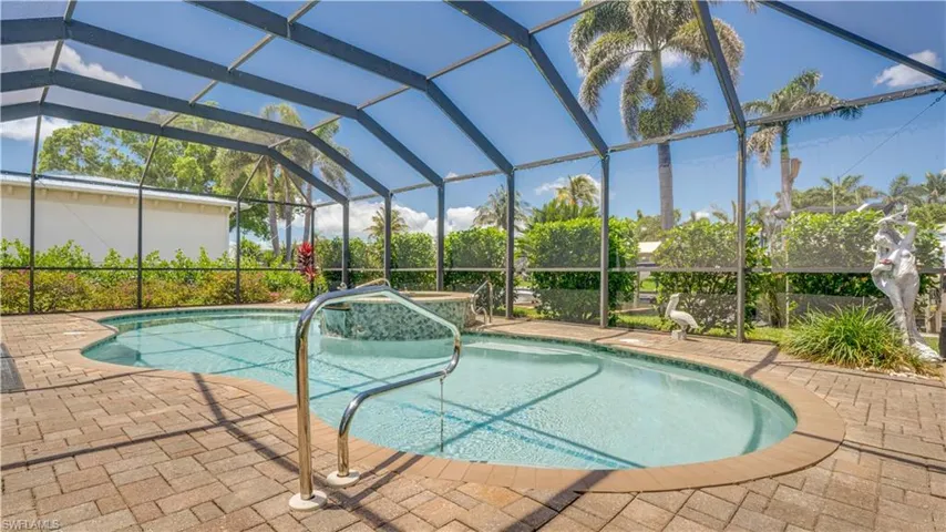 Free form pool & spa with waterfall.