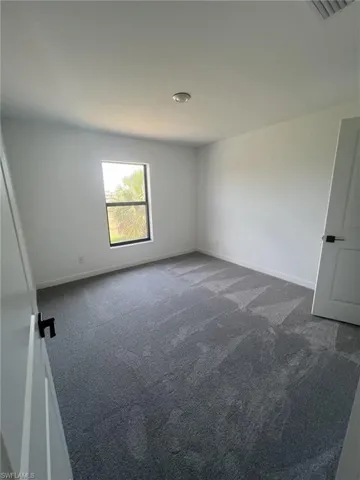 448  Burrstone  DR, Lehigh Acres, FL 33974