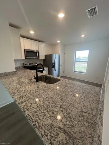 448  Burrstone  DR, Lehigh Acres, FL 33974