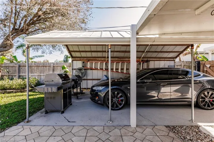 View of car parking with a carport