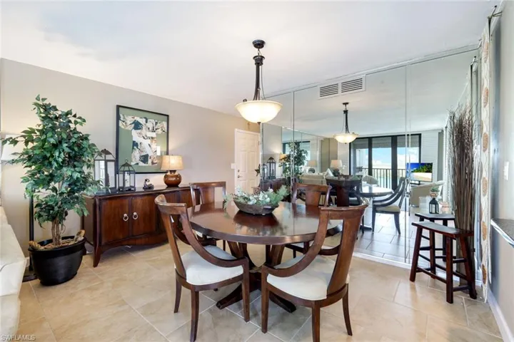 Dining room featuring light tile floors