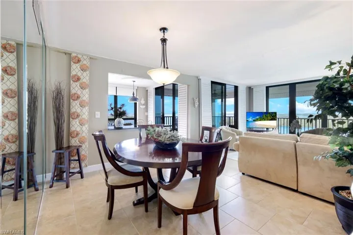 Dining area with light tile  floors