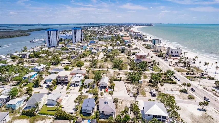 Bird's eye view featuring a beach view and a water view