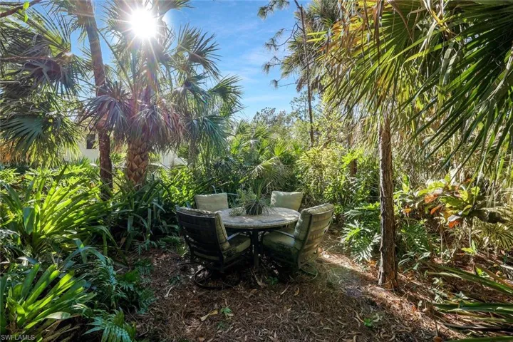 Private seating or workspace in the garden.