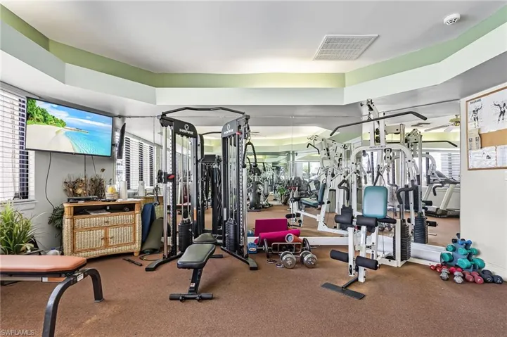 Fitness room with multiple machines and weights