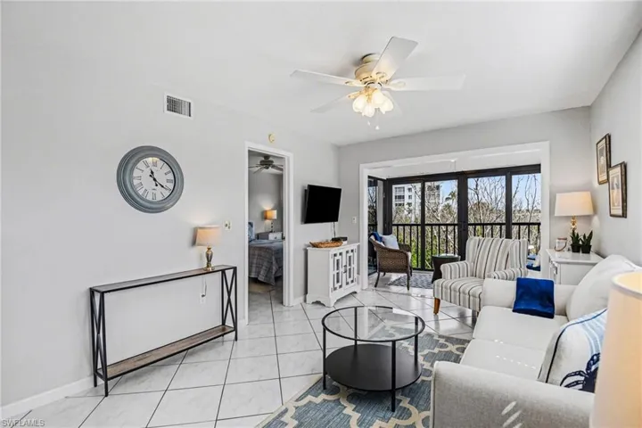 MAIN LIVING AREA SHOWING INCORPORATED LANAI SPACE AND ENTRANCE TO OWNER'S SUITE.