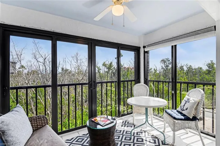 THE LANAI SPACE HAS BEEN INCORPORATED INTO THE MAIN LIVING SPACE.  GLASS SLIDING DOORS MAKE THE ROOM PERFECT IN ALL TYPES OF WEATHER.
