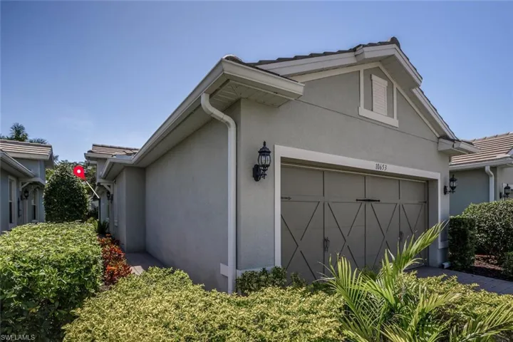 Absolutely spotless, move in ready, 2 bedroom plus den villa with 2 car garage.