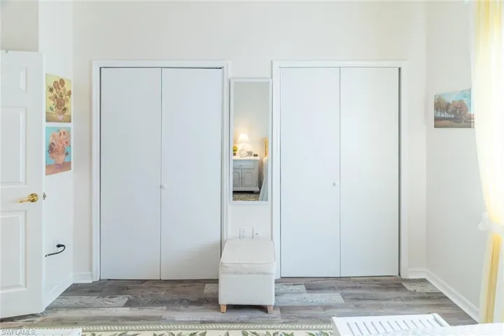 Bedroom with multiple closets
