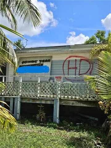 Front of house & porch. Teardown.